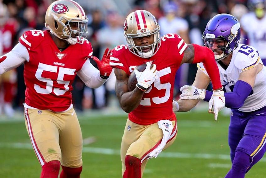 San Francisco 49ers cornerback Richard Sherman (25) intercepts a pass against the Minnesota Vikings in the third quarter in a NFC Divisional Round playoff football game at Levi's Stadium. 