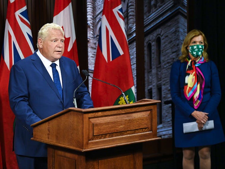 Ontario Premier Doug Ford makes an announcement with Health Minister Christine Elliott during the COVID-19 pandemic in Toronto on Thursday, September 24, 2020.