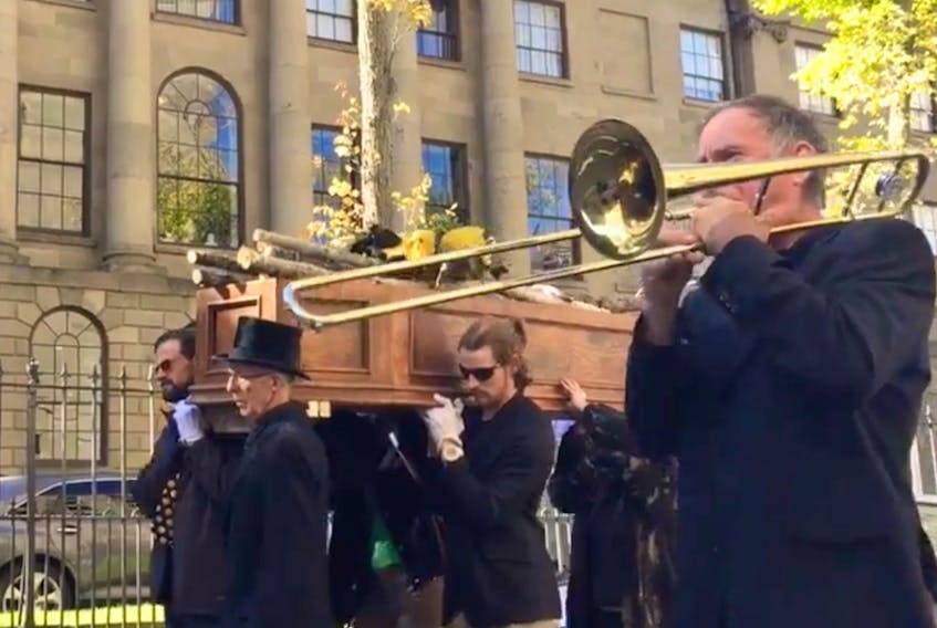 More than 500 people took part in a forest funeral in Halifax on Thursday.