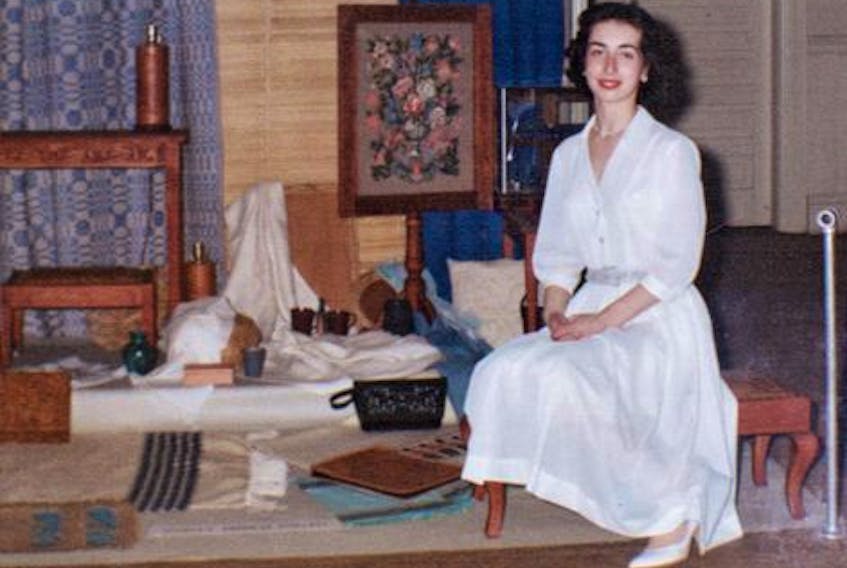 Patricia Pollett McClelland in 1960 with her graduation exhibition at Mount Allison University in Sackville, N.B. CONTRIBUTED