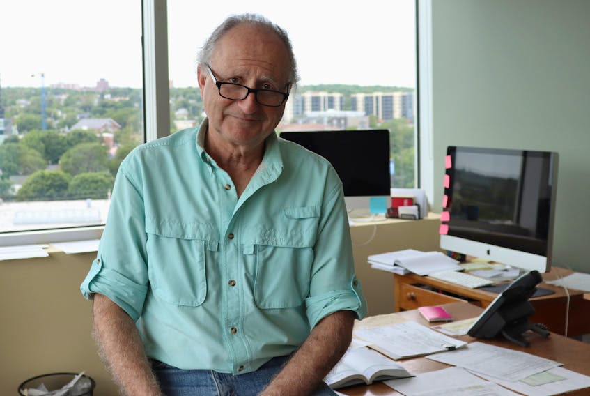 Immigration lawyer Lee Cohen, shown at his office in 2019, says the federal government is putting the life of his client - a former CSIS agent - at risk by throwing him out of the country. - File