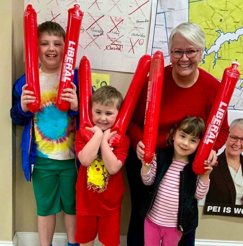 Former Liberal MLA Paula Biggar waits for the election results with her grandchildren, Xavier, left, Zander and Avery, right, on April 23, 2019.
