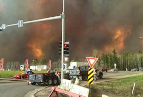 Photo taken by Karine Savoy as she and her family fled Fort McMurray Tuesday afternoon.&nbsp;