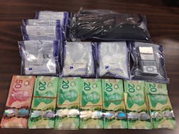 Drugs, money and weapons seized following a Cape Breton Regional Police traffic stop in Glace Bay Monday. Four people appeared in Sydney provincial court Tuesday facing various charges. CONTRIBUTED 