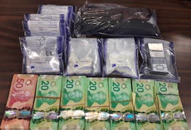 Drugs, money and weapons seized following a Cape Breton Regional Police traffic stop in Glace Bay Monday. Four people appeared in Sydney provincial court Tuesday facing various charges. CONTRIBUTED 