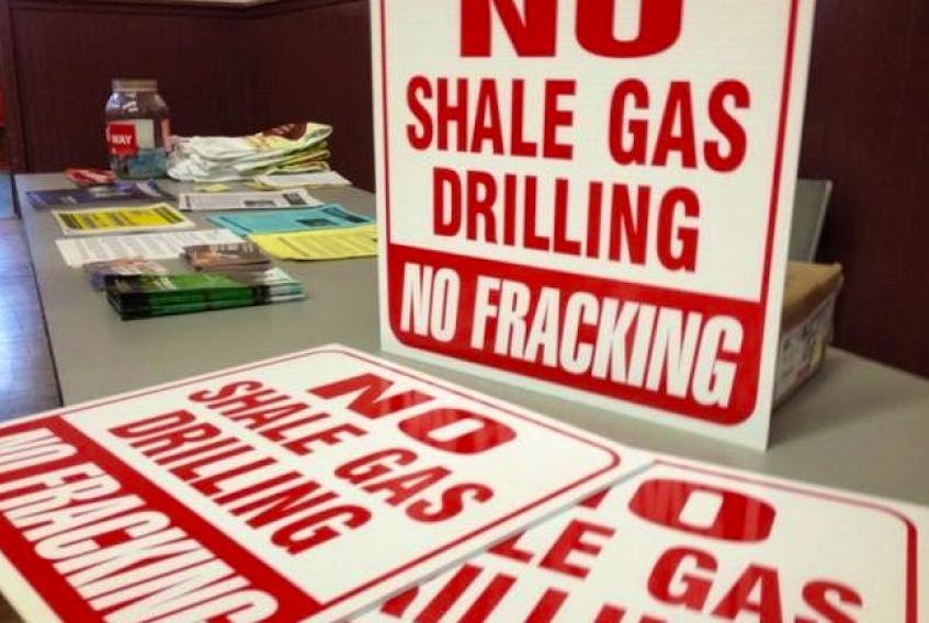 These signs of protest were on display at the July public information session on fracking in Windsor.