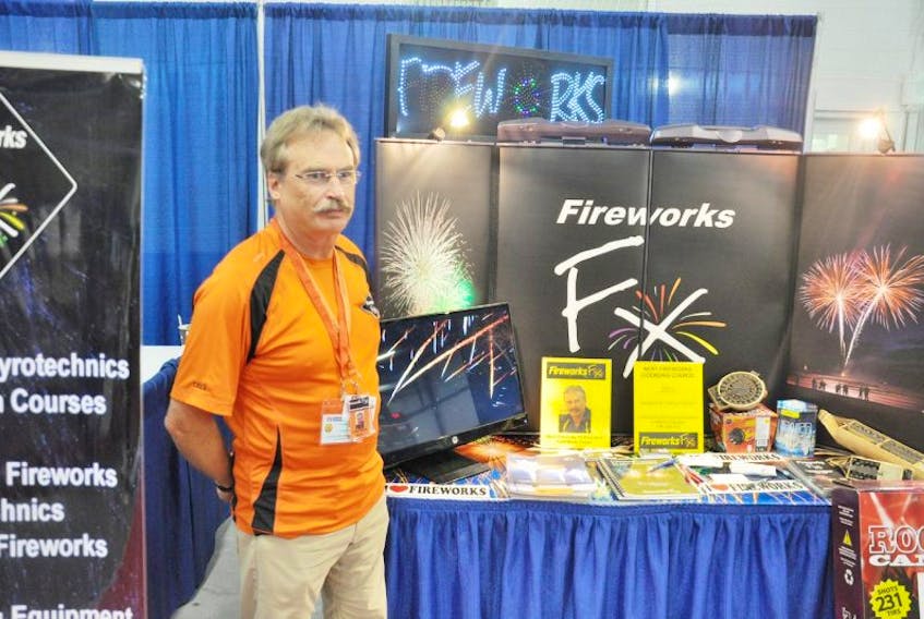 Fireworks FX president Fred Wade poses next to their booth at the Maritime Fire Chiefs Association trade show the weekend of July 5 and 6.&nbsp;
