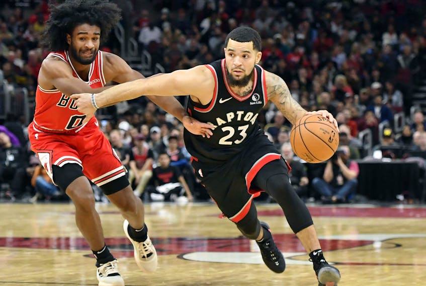 Raptors' Fred VanVleet (right) drives in the second half against Bulls guard Coby White during a recent game in Chicago. (USA TODAY SPORTS)