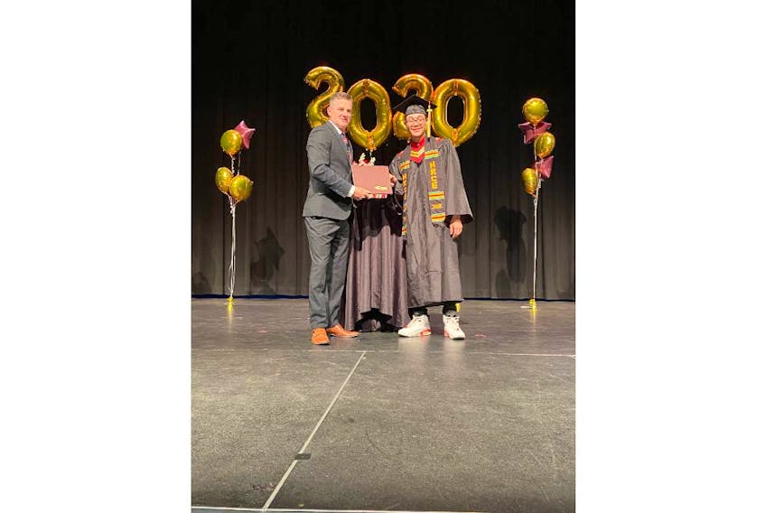 Principal Joe Morrison is shown with 2020 grad Makye Clayton during the recent graduation ceremonies at Halifax’s Citadel High School. CONTRIBUTED