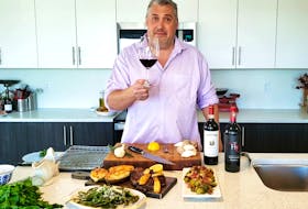 Saltwire Network's Mark DeWolf creates a steakhouse-style dinner featuring local beef. CONTRIBUTED
