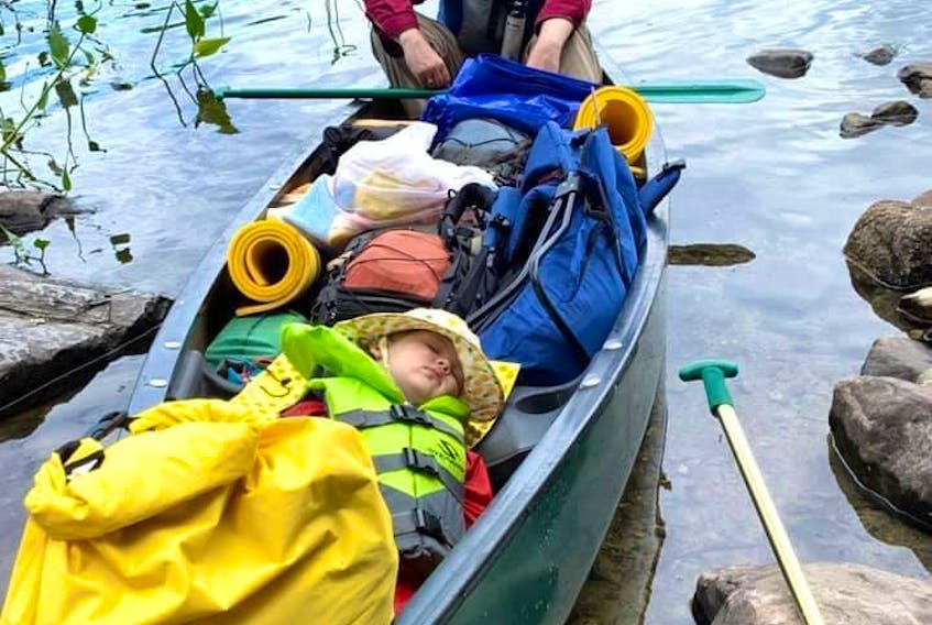 Mark Gruchy and his daughter, Charlotte, during 10-day trip to Kejimkujik National Park, NS, in August 2019. For young children, canoes, like cars, are great places to nap. 