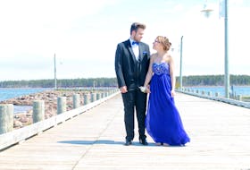 “As much as they don’t get their prom this year, or not like a regular prom, they still should be able to have pictures in their tuxes and in their gowns with their families and with their friends," says Irma Tremblay of Alberton, P.E.I., the owner of ILT Photography.