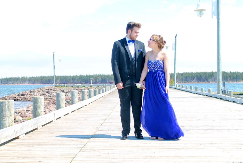 “As much as they don’t get their prom this year, or not like a regular prom, they still should be able to have pictures in their tuxes and in their gowns with their families and with their friends," says Irma Tremblay of Alberton, P.E.I., the owner of ILT Photography.