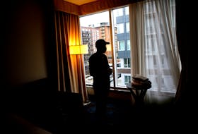 "Andy" is seen in a hotel room during an interview in Halifax Friday January 29, 2021. Andy recently escaped intimate partner violence and is planning to move into a new apartment in Halifax this month with the help of Barry House and Adsum for Women & Children.

TIM KROCHAK PHOTO