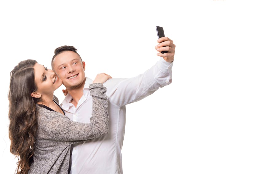 A selfie? You won't catch Heather Huybregts and her husband taking one. But, as she reflects on their sixth wedding anniversary, that's absolutely fine.