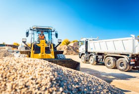 Columnist Heather Huybregts learned a little too late that moving rocks is much faster with a loader than a shovel. 123rf Stock