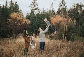 Amanda Dinn, of Amanda Dinn Photography in Paradise, N.L., captured this photo of the Murphy family this year after being forced to close her business for several months during the first wave of COVID-19. She says people now realize how precious life is and how important it is to capture these moments. 