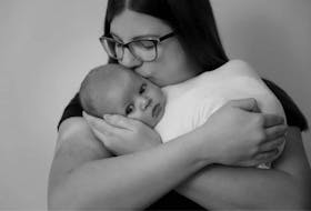Andrea Wheeler with her newborn son, Cameron. Due to COVID, the new mom from Newfoundland says her husband had to leave the hospital four hours after their child was born. 