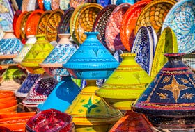 The North Africa dinner table is colourful with tagine pots that are traditionally used to cook roast meats. 123RF STOCK PHOTO





