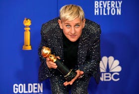 Ellen DeGeneres poses backstage with her Carol Burnett award at the 77th Golden Globe Awards last January. On Dec. 11, DeGeneres announced via Instagram that she had COVID-19. REUTERS/Mike Blake