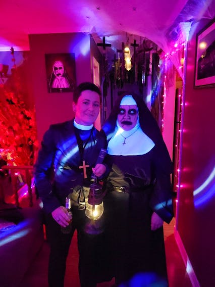 Melanie Burry invites people to her home at 4 Holden St. in Mount Pearl, NL to see this year’s theme of 13 Ghosts. Each year, Burry picks a different movie theme to decorate her home. Burry and her family members also dress up in the theme each year. Here, they are pictured in the 2019 costumes.