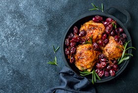 Roast chicken thighs deliver rich, succulent flavours to a one-pot dish. - 123RF STOCK PHOTO