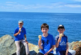 Gina Bell's three sons enjoy an ice cream treat by the water. While summer may look different this year, you can still have plenty of fun close to home.