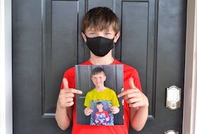 If you normally take a first day of school picture of your kids, try having them wear a mask - it will demonstrate how unique 2020 is, says Gina Bell.