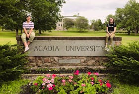 Sarah MacDonald and Kelsey MacGowan pictured together at Acadia University, where they were roommates. As recent graduates, both have found it difficult to work within and apply for jobs during the COVID-19 pandemic.