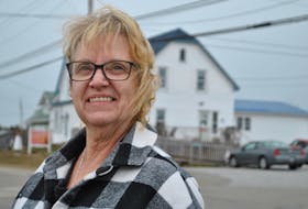 Lorraine Deveau is the owner/operator of the Cape View Seniors Boarding Home in Clark’s Harbour, which is seen in the background. KATHY JOHNSON/SALTWIRE NETWORK