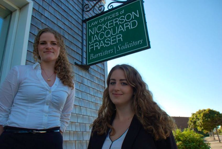 <p>Inga Fuessman and Julia Hubert are studying law in Germany. They recently completed a four-week internship with a local law firm.<br />CARLA ALLEN PHOTO</p>
