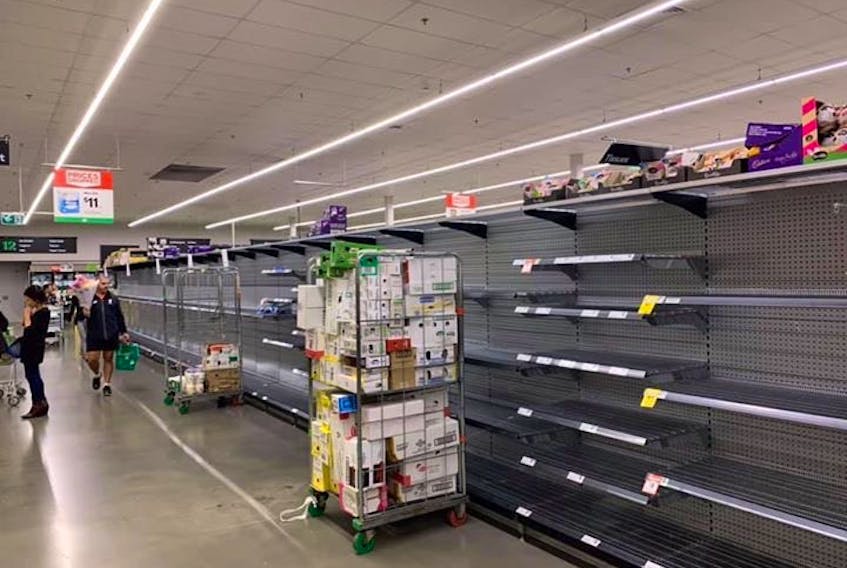 Island native Lindsay Clements, who lives in Australia, snapped a picture of an isle in her grocery store that normally carries toilet paper, rice and pasta. Clements said she has to drive out of Sydney to the suburbs just to find a box of Kleenex. 