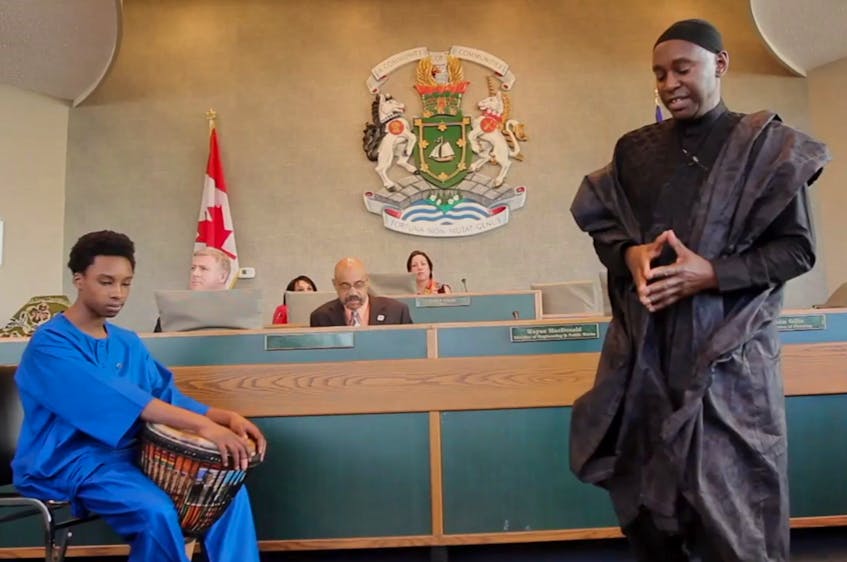 Guideon Lucas, right, an elder from Whitney Pier, takes part in an African Heritage Month proclamation ceremony at the Cape Breton Regional Municipality City Hall in this photo which was used in The Value Project documentary done by two youth workers at the Boys and Girls Club of Cape Breton. CONTRIBUTED 