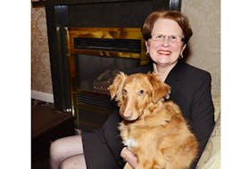 Faye Doucette, who owns the Belvedere Funeral Home, adopted Odie, a now-five-year-old sheltie/golden retriever, last year to serve as a comfort dog for the grieving. Odie spends his off-time living with Doucette.