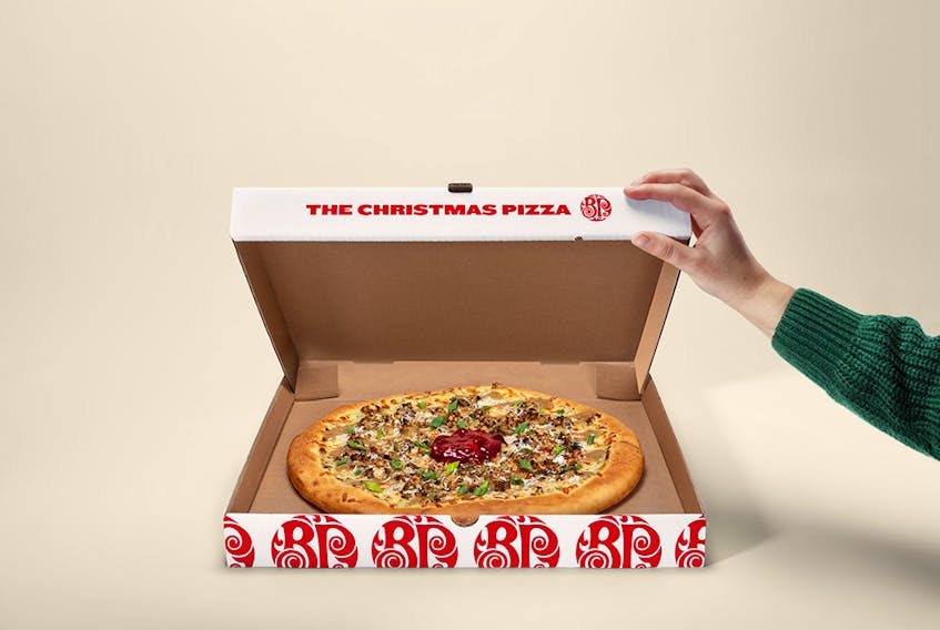 Boston Pizza's Christmas Pizza is delivered in a limited edition musical box. 