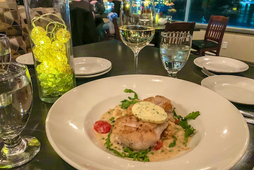 The pan-fried cod at Vu Resto bar is served with gnocchi in a cream sauce. — Gabby Peyton photo

