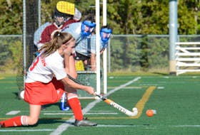 Ashlyn Kelly of the Charlottetown Rural Raiders makes a pass to a teammate off a first-half penalty corner during Monday’s Prince Edward Island School Athletic Association senior field hockey game with the Colonel Gray Colonels.