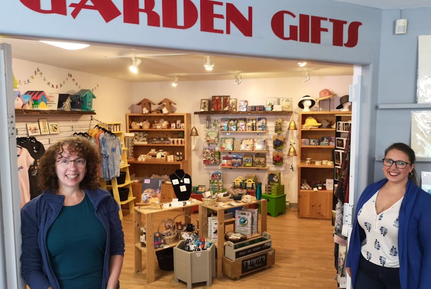 Anita Carroll (left), the owner of Posie Row, started volunteering at the Memorial University Botanical Garden by curating products to bring into the gift shop. Ashley Wright (right), marketing adviser with the garden, says Carroll has turned the gift shop into a destination of its own. – Andrew Waterman/The Telegram