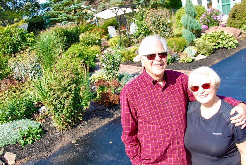 Charlottetown residents Keith and Charleen Wornell stand in front of their impressive front yard that earned the couple the Mayor’s Award in the 2018 Make Our Hometown Beautiful program. Keith is quick to give all the credit to his wife/hobby gardener Charleen.