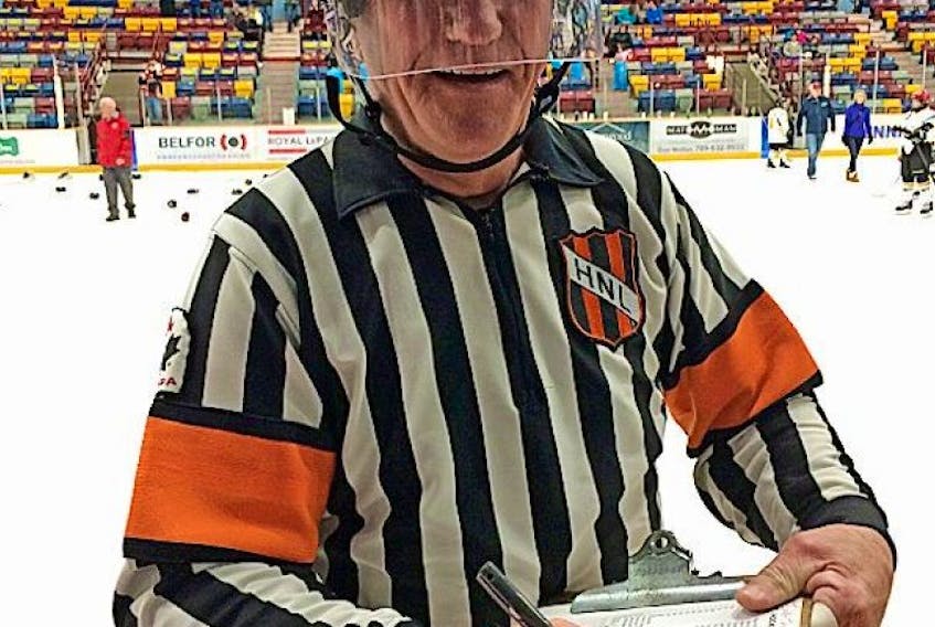 Gary Callahan poses for a photo after signing the last scoresheet of his final game as a hockey official. Callahan is hanging up the armbands and it didn’t take long for Corner Brook Minor Hockey Association to recognize his dedication as the group presented him with a Special Recognition Award at its year-end banquet earlier this week.