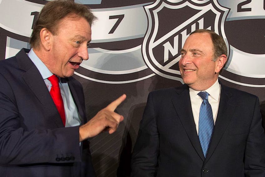 NHL commissioner Gary Bettman and Ottawa Senators owner Eugene Melnyk are seen together in December 2017.