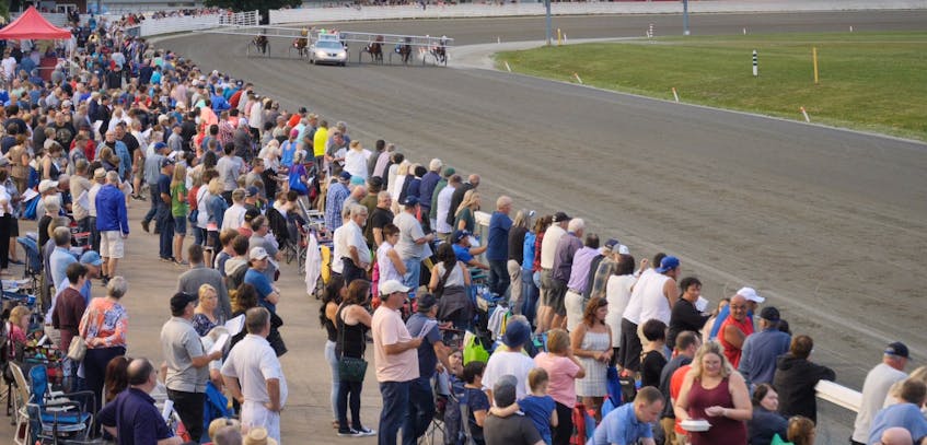 The crowd at Old Home Week prepare for the start of a race at Red Shores at the Charlottetown Driving Park. Curtis MacDonald/Special to The Guardian