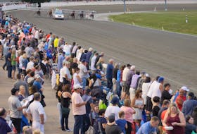 The crowd at Old Home Week prepare for the start of a race at Red Shores at the Charlottetown Driving Park. Curtis MacDonald/Special to The Guardian