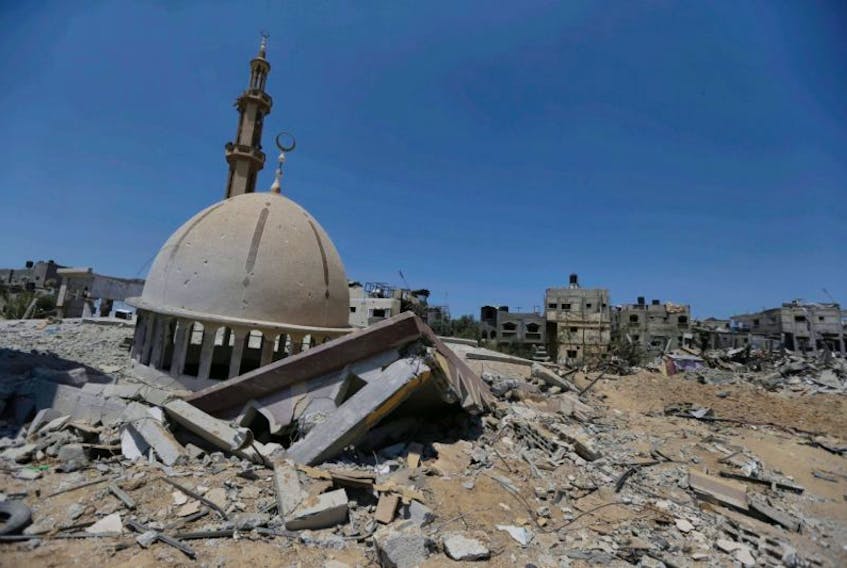The dome of a mosque, destroyed by Israeli strikes during the war, is seen in Khuzaa, east of Khan Younis, in the southern Gaza Strip on Aug. 11, 2014