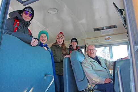George Baxter and his final passengers – his grandchildren Grace, Makayla, Casey and Percy King – on his last day as a bus driver with the Strait Regional Centre for Education Jan. 31. Corey LeBlanc 
