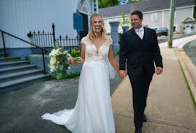 Newlyweds Tara and Richard Barry, after their wedding at the Wesley United Church on Saturday. – Andrew Waterman/The Telegram