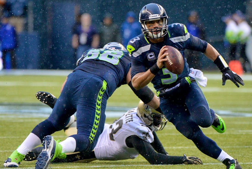 Russell Wilson and the Seattle Seahawks should win today in a defensive struggle over a banged-up Jared Goff and the Rams.   