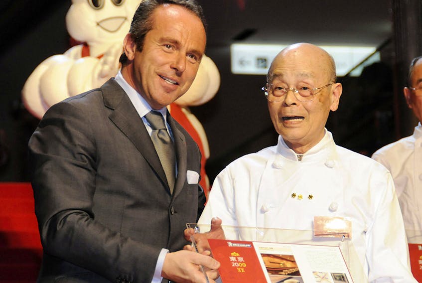 Michelin director Jean-Luc Naret, left, is pictured with sushi chef Jiro Ono of Sukiyabashi Jiro during a presentation of the 2009 Michelin Guide Tokyo on November 18, 2008. 