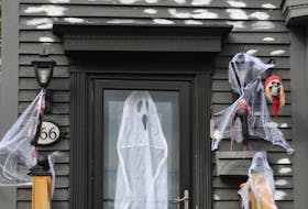 It’s not 666 for the address, but the “66” gives the devilish effect at this home on Hamilton Avenue in the city’s west-end with the “Grim Reaper” and other scary sights visible there.
-Joe Gibbons/The Telegram
