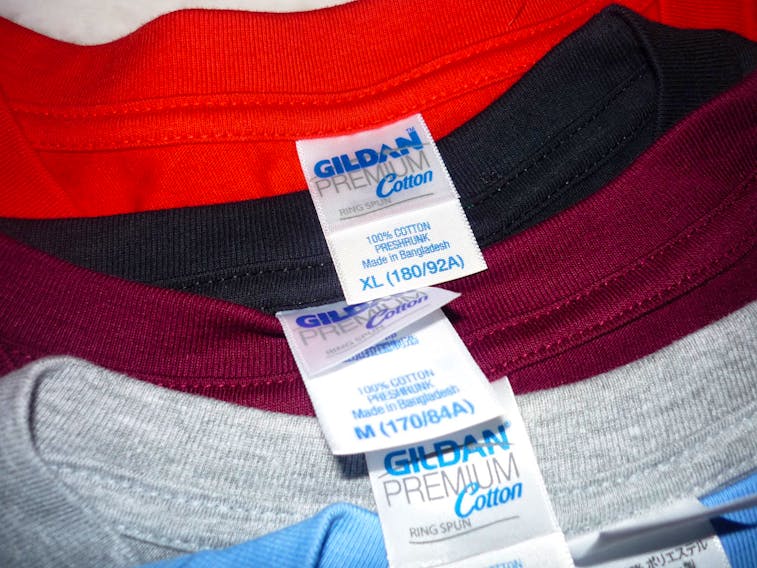 Gildan said weaker-than-expected demand in its imprintables business would continue.